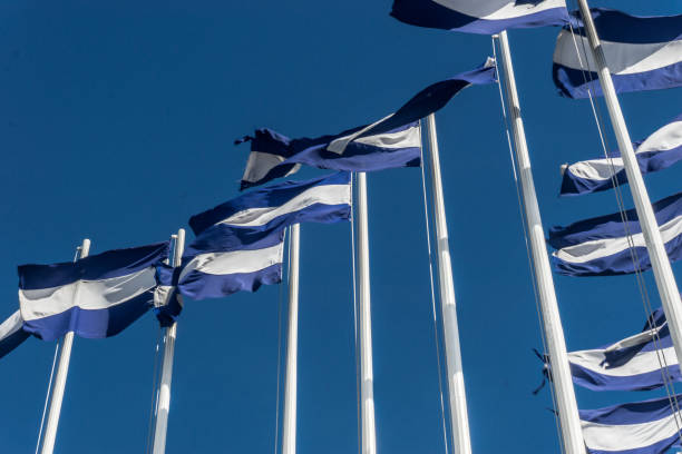istock nicaragua flags on blue sky at background 686423318