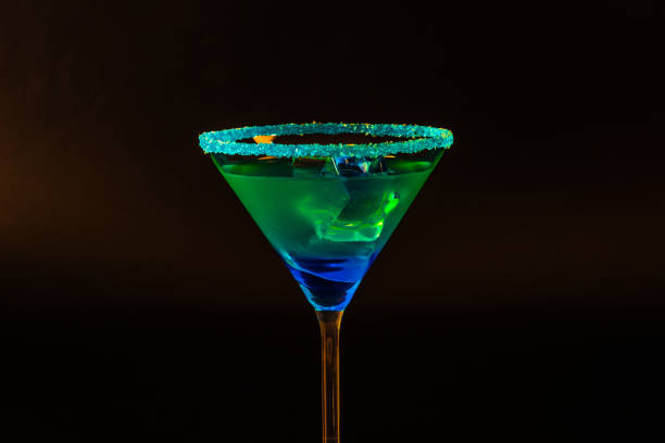 istock Colorful drink in a cocktail glass, with ice cubes, summer drink 686432066