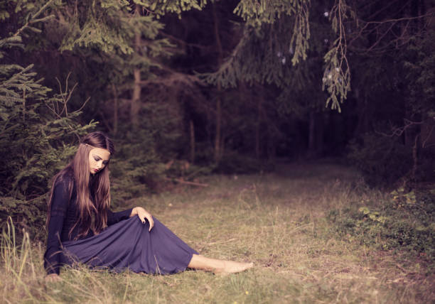 istock young beautiful women in autumn forest 686435990