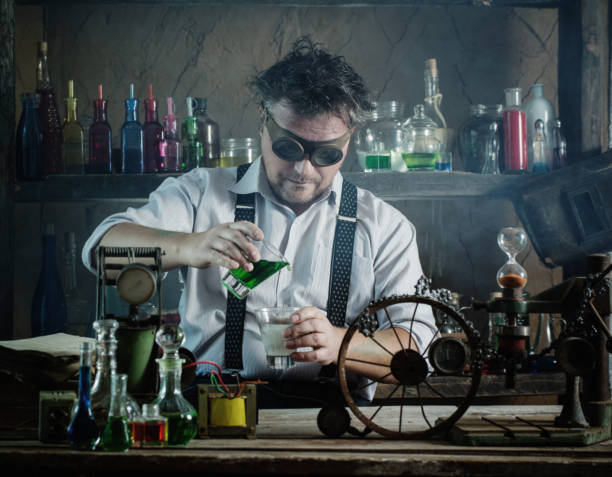 crazy medieval scientist working in his laboratory - old laboratory alchemy alchemist imagens e fotografias de stock