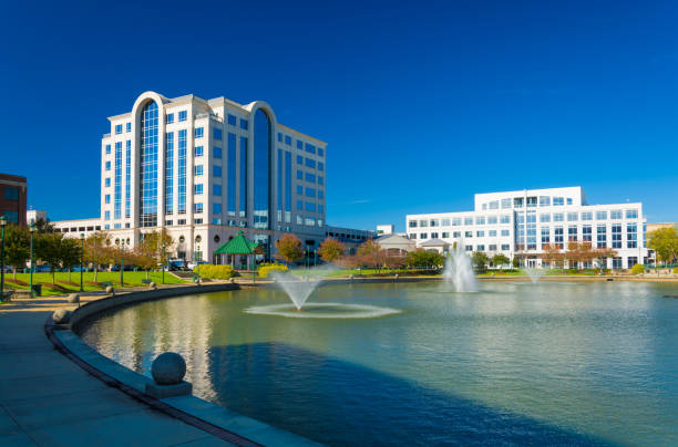 Newport News Skyline with Fountains Newport News office buildings with multiple fountains and a lake.  Newport News is part of the Hampton Roads / Virginia Beach area. hampton virginia photos stock pictures, royalty-free photos & images