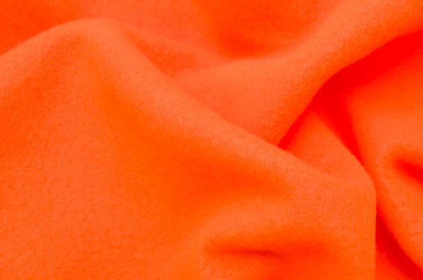 istock orange fleece fabric background,texture 686457830