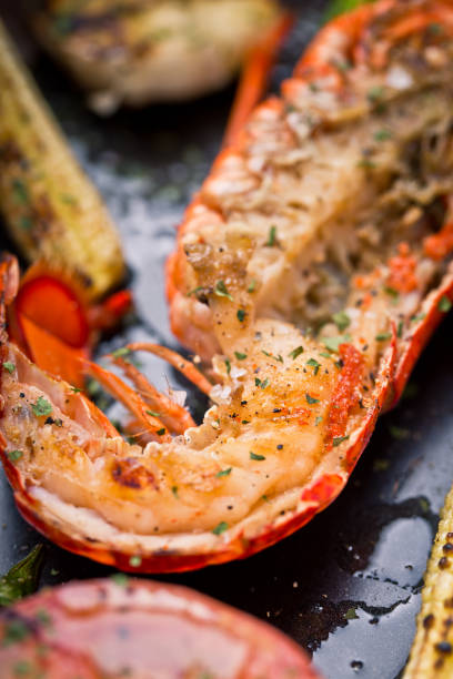 deliziosa aragosta fresca cotta e grigliata - lobster steak lobster tail main course foto e immagini stock