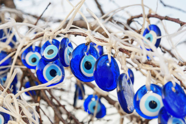 istock Nazars, Turkish Evil eye charms on the tree. Goreme. Cappadocia. Turkey 686482238
