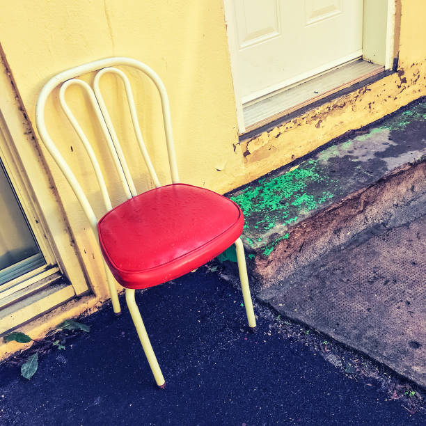 istock Bright chair outside the house 686488420