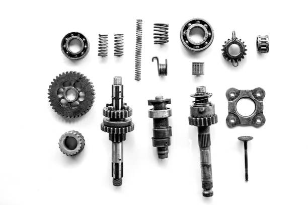 Old parts of motorcycles background with hard light black and white tone. repair and maintenance old parts of engine Old parts of motorcycles background with hard light black and white tone. repair and maintenance old parts of engine used motorcycle parts stock pictures, royalty-free photos & images