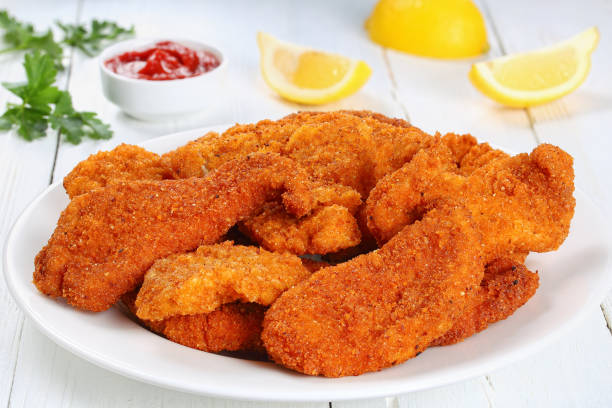 istock homemade chicken nuggets on white plate 686501692