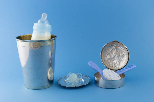 istock Baby boy luxury items on pale blue background 686504600