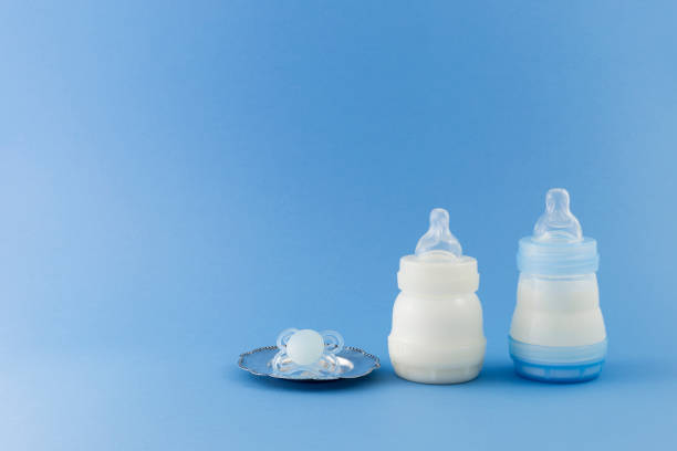 istock Baby boy luxury items on pale blue background 686504876