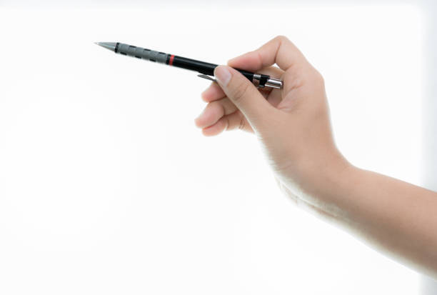 istock Hand is hold black pen ready for drawing Isolated 686516580