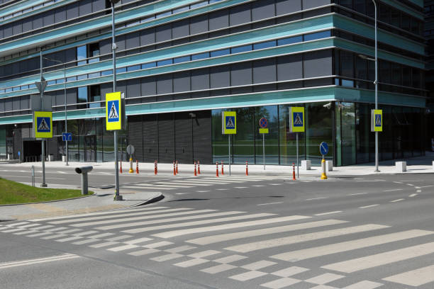 istock The empty solar spring intersection and crosswalks near the modern glass no name building concept. Urnban May landscape 686518774