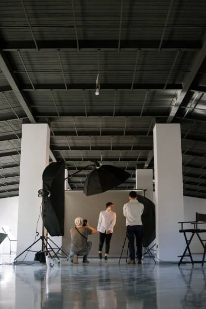 istock Creative photo and video team shooting in studio 686522204