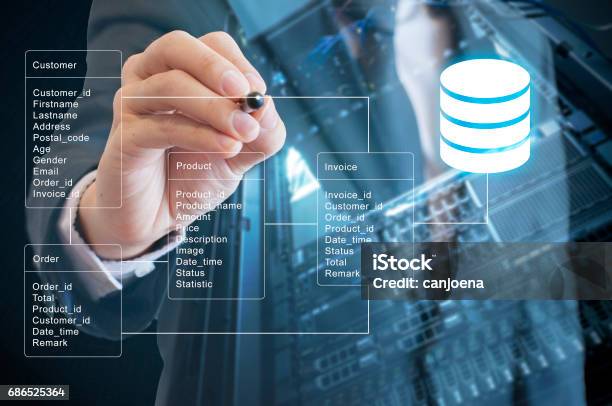 Double Exposure Of Professional Businessman System Analysis Design And Drawing Database Table With Futuristic Background Stock Photo - Download Image Now