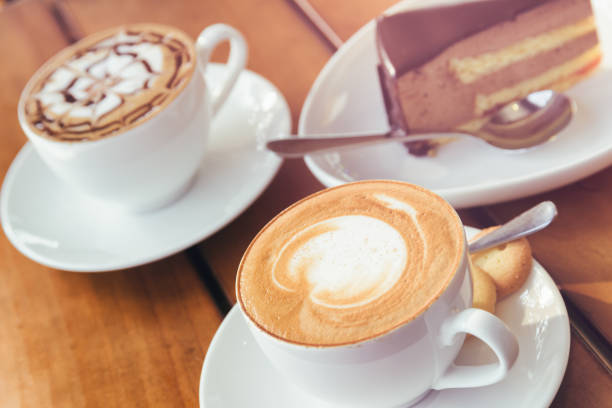 istock Cappuccino coffee and chocolate mousse cake. Toned image 686528766