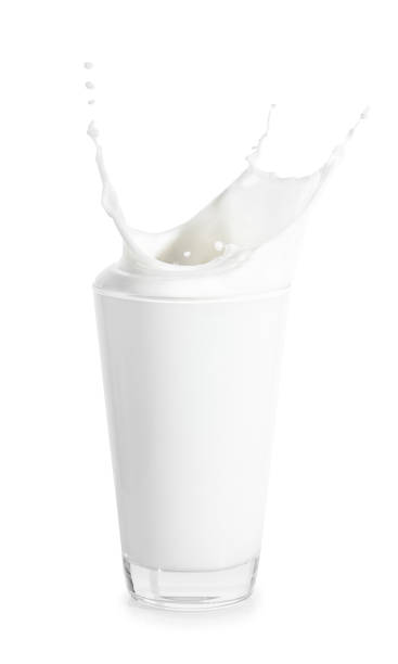 istock big glass of milk with splashes 686529360