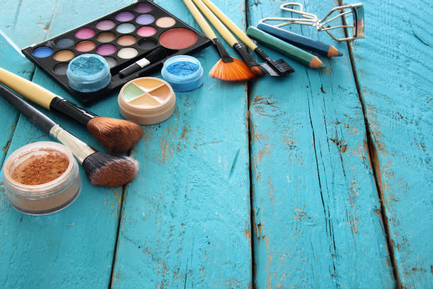 istock makeup cosmetics beauty tools and brushes on wooden background 686535338