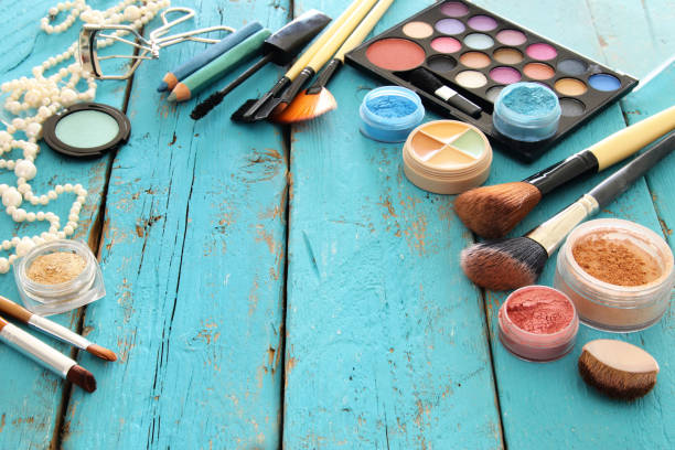 istock makeup cosmetics beauty tools and brushes on wooden background 686535530