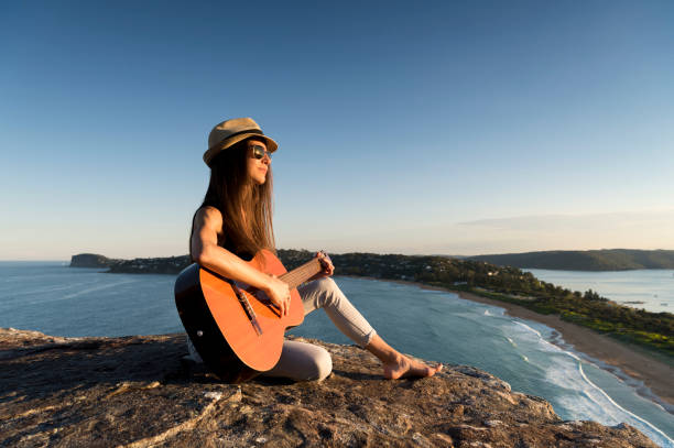 istock Guitar music at sunset 686543884