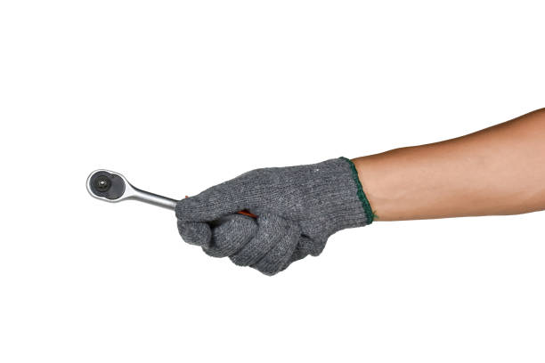 istock a hand holding ratchet wrench 686549764