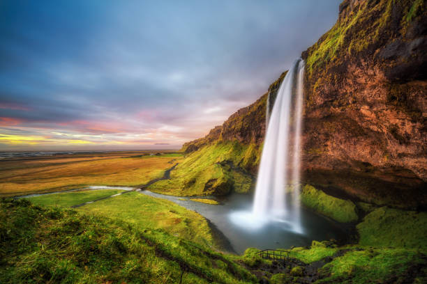istock Seljalandsfoss Waterfall  in Iceland at sunset 686552914
