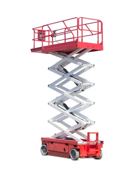 Photo of Scissor self propelled lift on a light background