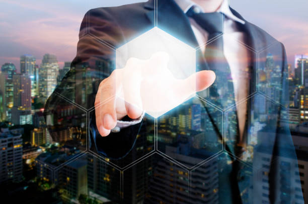 istock Double exposure of professional businessman touching hexagonal polygon button on a digital interface and city of business background in business and technology choices concept 686553842