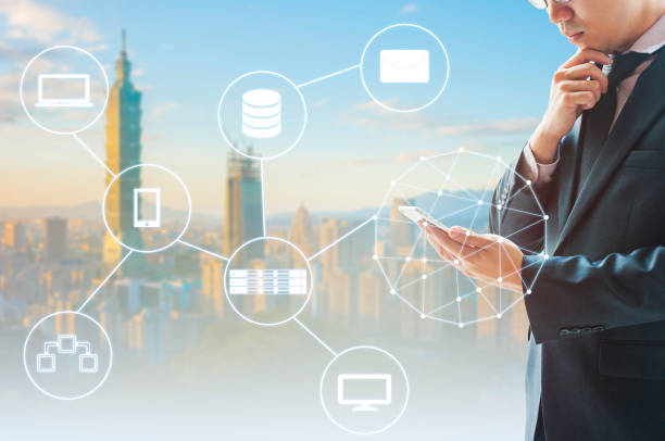 istock Double exposure of professional businessman connected internet and wireless network with his smart phone and city of business background in business trading and technology concept 686556772
