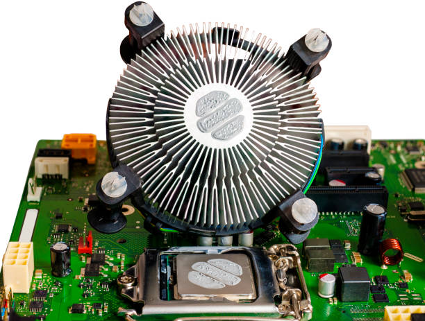 istock The cooling fan and CPU thermal paste applied before mounting the motherboard 686561892