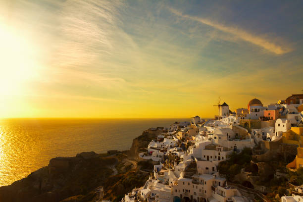 istock windmill of Oia at sunset, Santorini 686562118