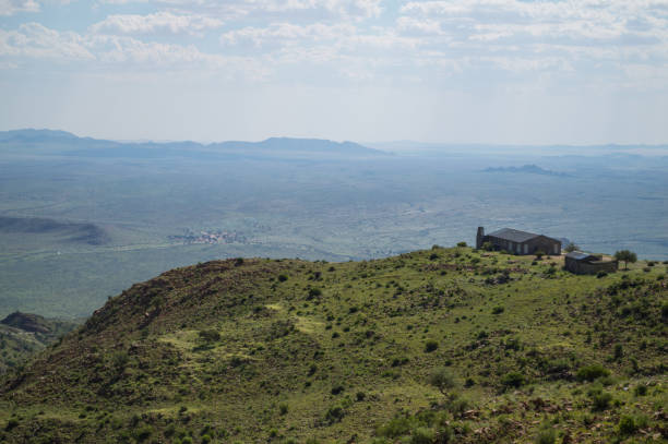 istock Lush Mountain Landscape with Road and House with a View in Namibia 686562122