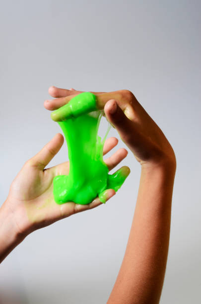 istock Pate slime elastic and viscous on child's hand 686566924