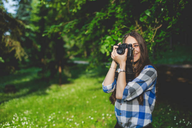 istock Girl taking a photo 686578746