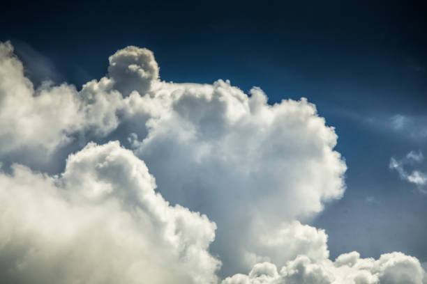 istock Cloud Typologies: Cumulus Clouds in moody Sky during Sumer Monsoon Thunder Storm. 686579000