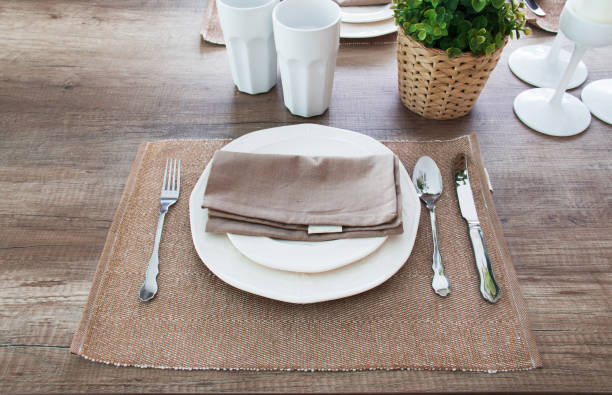 istock Top view of plate set on wooden table decoration. 686582890