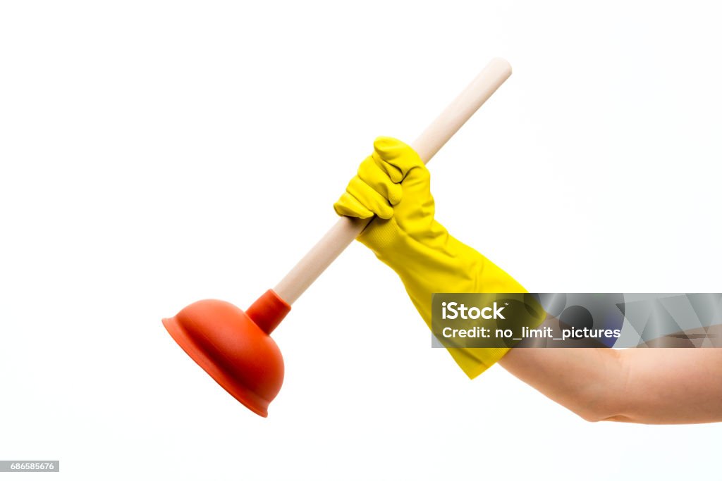 plunger in hand plunger in hand on white background Arm Stock Photo