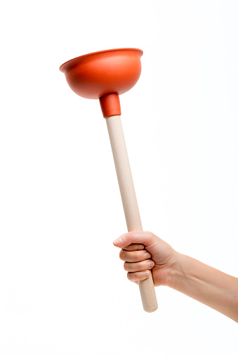 plunger in hand on white background