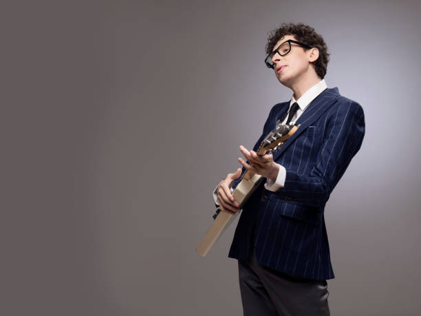 istock Funny man playing electric guitar 686588226