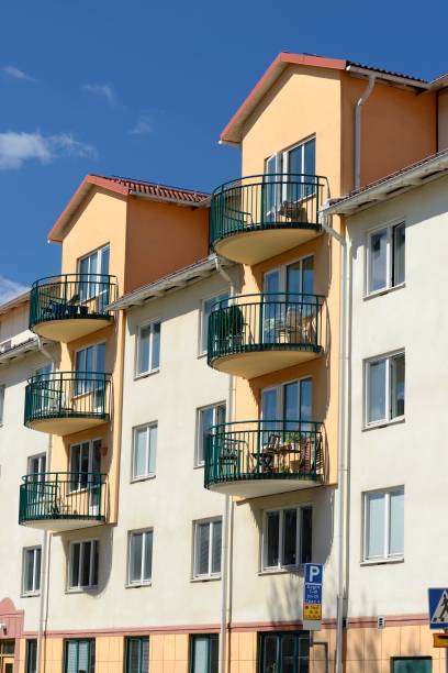 apartment building facade with windows and balconys - plattenbau homes architectural detail architecture and buildings imagens e fotografias de stock