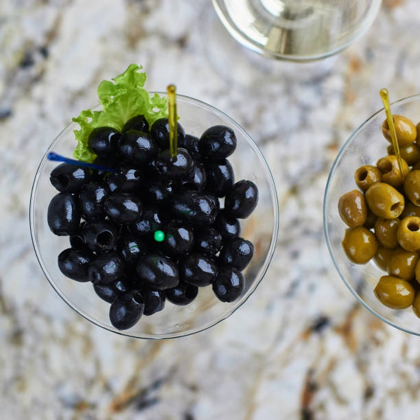 istock Appetizer. Tasty olives in glass 686598458