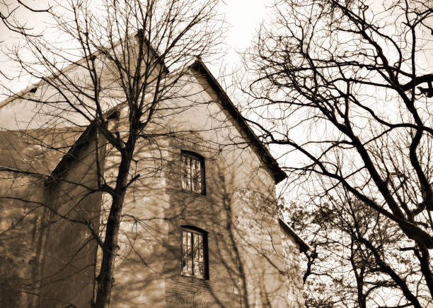 Creative abstract stylized view of old grunge abandoned house, home or building