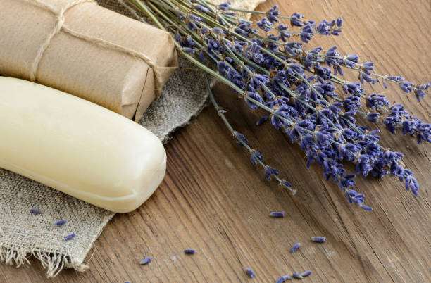 istock Dried lavender flowers with a soap on a rustic background 686603634