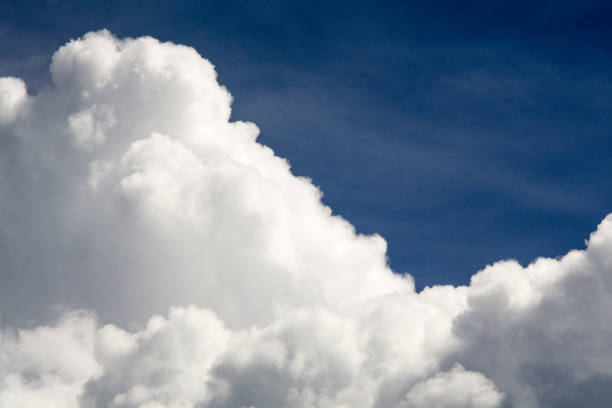 istock Cloud Typologies: Cumulus Clouds in moody Sky during Sumer Monsoon Thunder Storm. 686604426