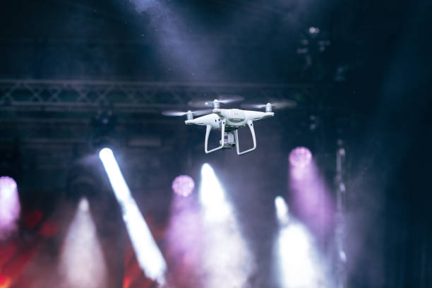 small drone shooting scene at outdoors concert - filming point of view fotos imagens e fotografias de stock