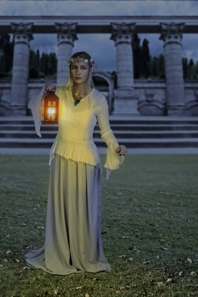 istock female high elf with lantern at night 686617012