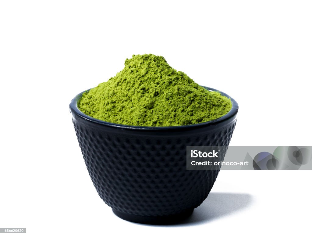 green matcha tea powder green matcha tea powder in black bowl isolated on white background Matcha Tea Stock Photo