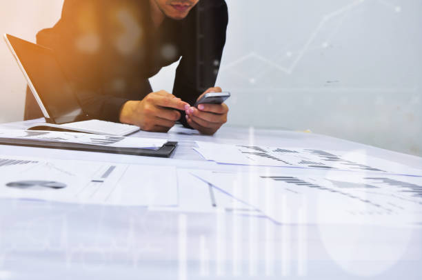 istock Businessman working at office. Digital tablet laptop computer smart phone 686627350
