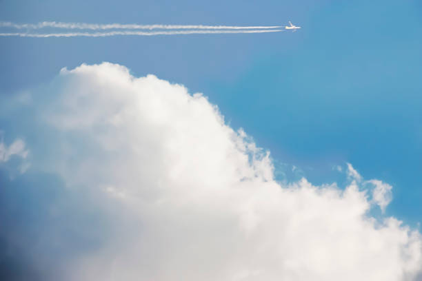 istock Beautiful Blue sky with white clouds and aircraft fly over. 686635922