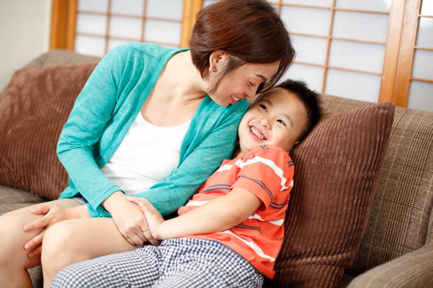 istock Mother and son play at home 686636048