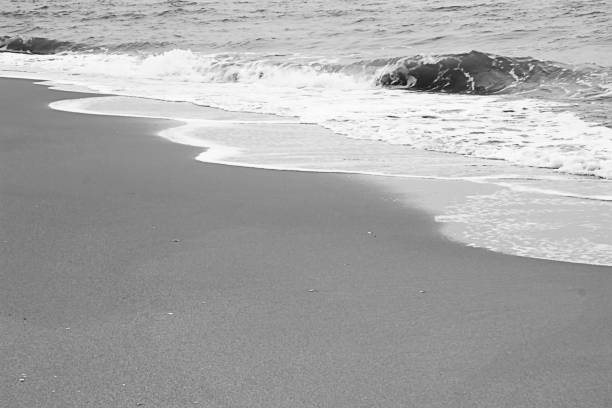 istock The Wave ,The Sand and the Beach in Black and White. 686636098