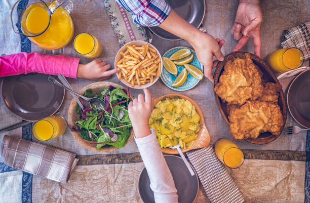 istock Wiener Schnitzel with Potatoes and Green Salad 686636340